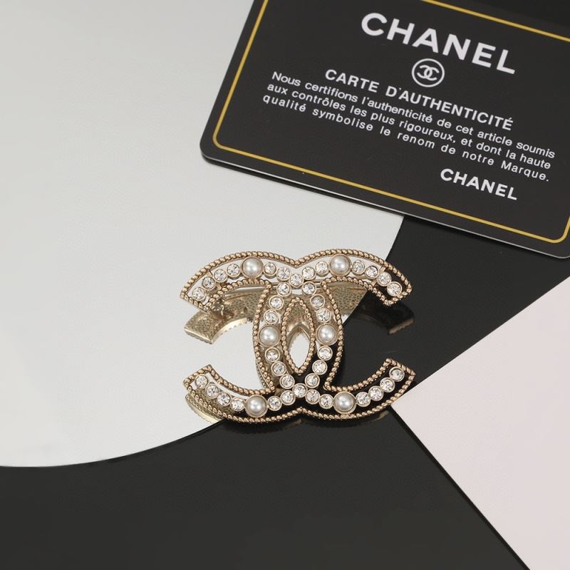 Ch**el brooches